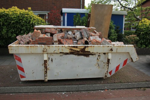 A waste collection truck operating in South West London